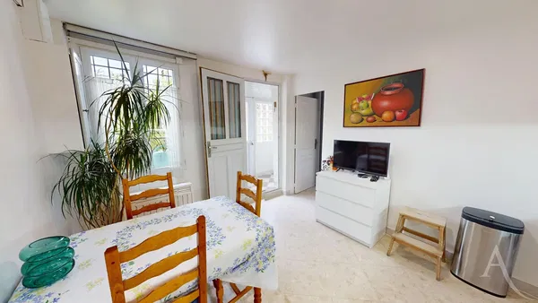 Kitchen; kitchen appliances, wood floor, natural light, modern style, renovated