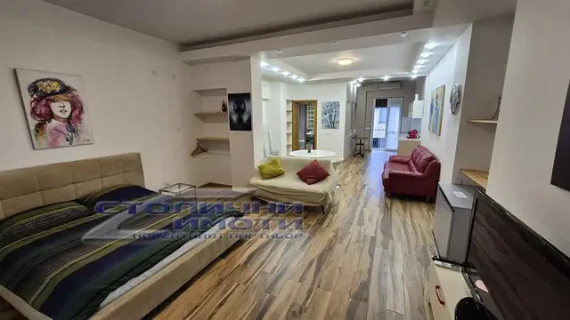 Kitchen; kitchen appliances, wood floor, natural light, modern style, renovated