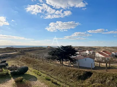 Kitchen; kitchen appliances, wood floor, natural light, modern style, renovated