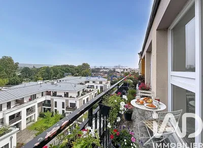 Kitchen; kitchen appliances, wood floor, natural light, modern style, renovated