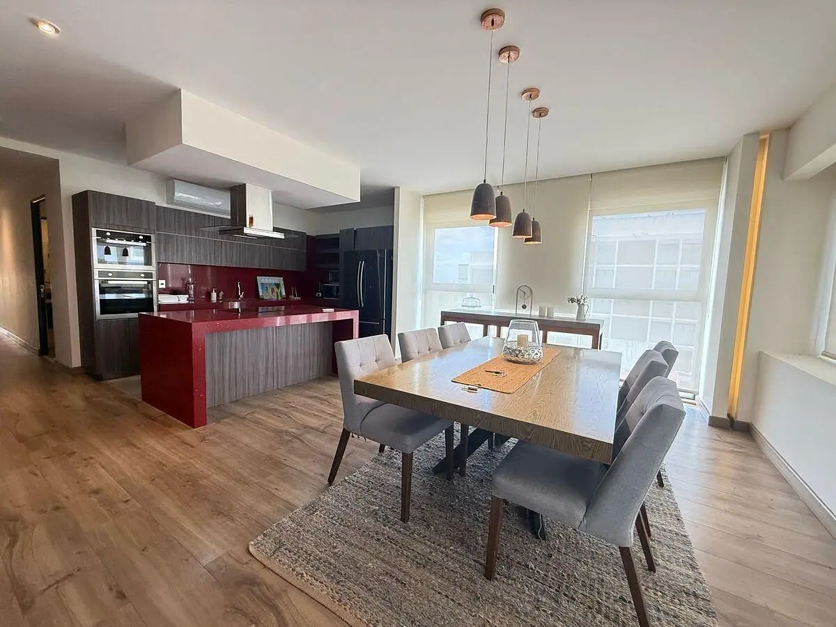 Kitchen; kitchen appliances, wood floor, natural light, modern style, renovated