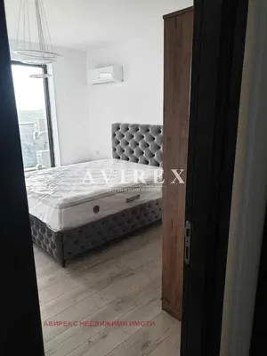 Living room; wood floor, natural light, modern style, high ceiling