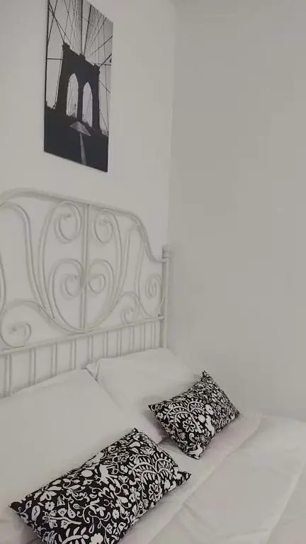 Kitchen; kitchen appliances, wood floor, natural light, modern style