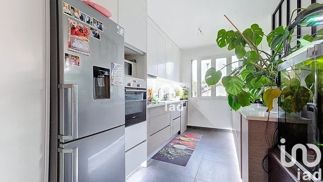 Kitchen; kitchen appliances, wood floor, natural light, modern style