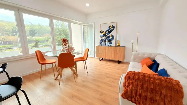 Kitchen; kitchen appliances, wood floor, natural light, modern style