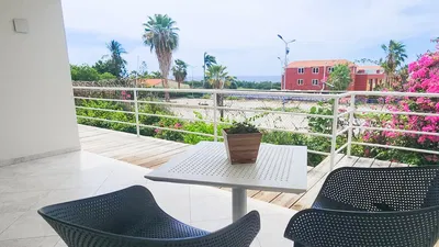 Kitchen; kitchen appliances, tile floor, natural light, modern style