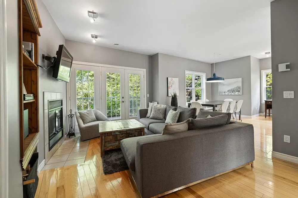 Kitchen; kitchen appliances, wood floor, natural light, modern style