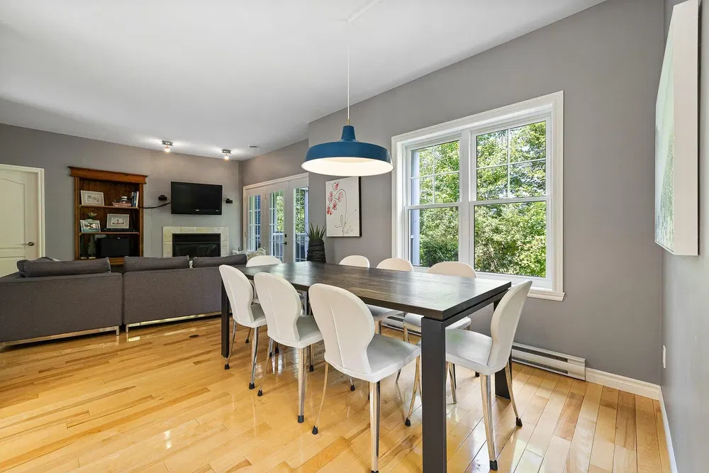 Kitchen; kitchen appliances, wood floor, natural light, modern style