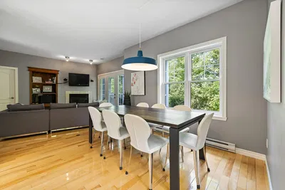 Kitchen; kitchen appliances, wood floor, natural light, modern style