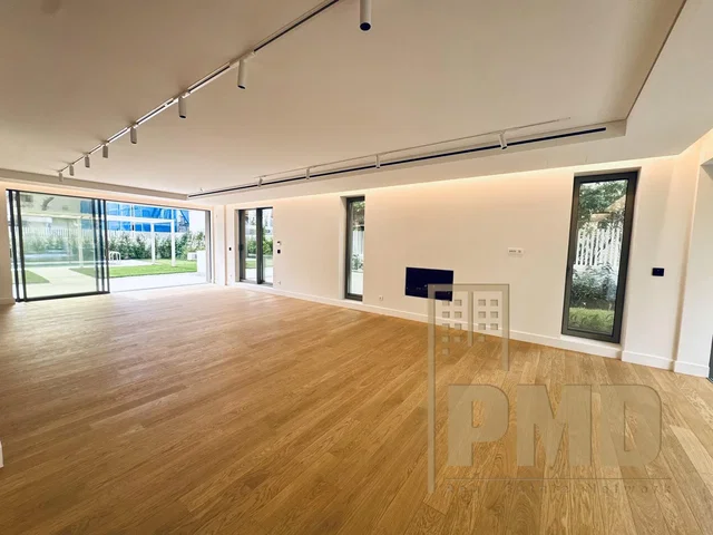 Kitchen; kitchen appliances, wood floor, natural light, modern style