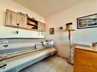 Kitchen; kitchen appliances, wood floor, natural light, modern style