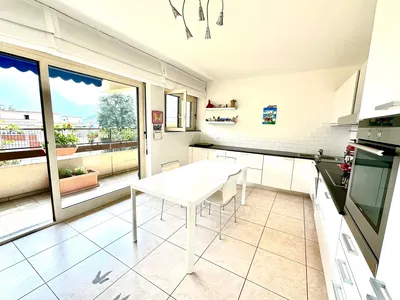 Kitchen; kitchen appliances, wood floor, natural light, modern style
