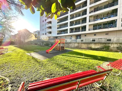 Kitchen; kitchen appliances, wood floor, natural light, modern style