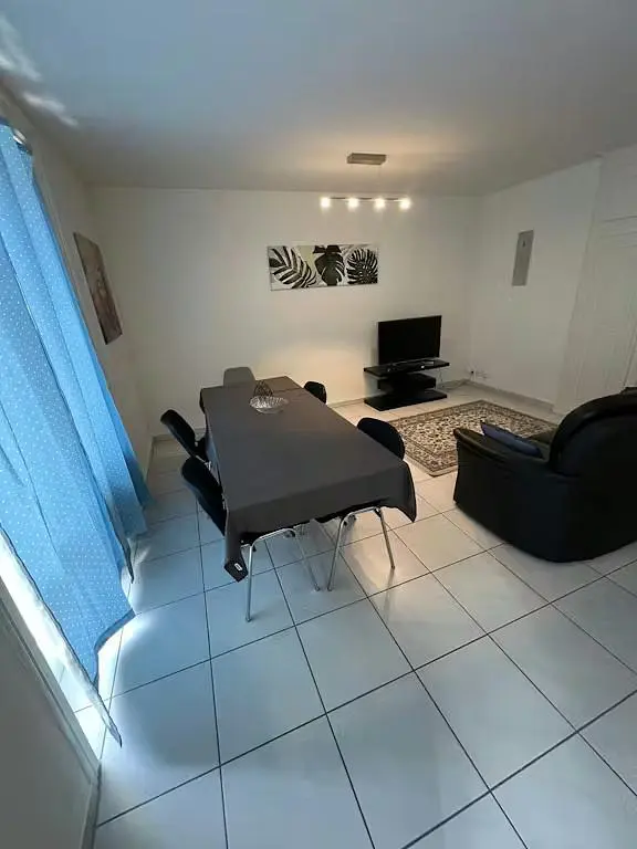 Kitchen; kitchen appliances, wood floor, natural light, modern style