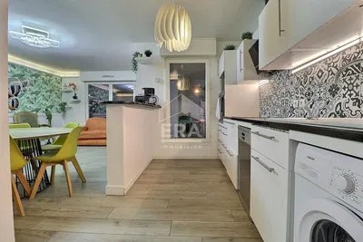 Kitchen; kitchen appliances, tile floor, natural light, modern style