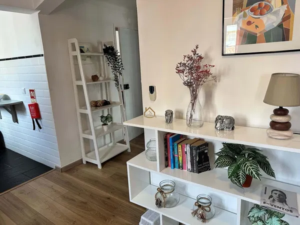 Kitchen; kitchen appliances, wood floor, natural light, modern style