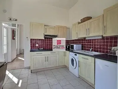 Kitchen; kitchen appliances, wood floor, natural light, modern style