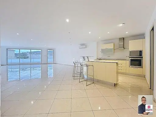 Kitchen; kitchen appliances, wood floor, natural light, modern style