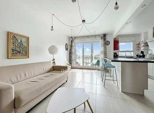Kitchen; kitchen appliances, wood floor, natural light, modern style