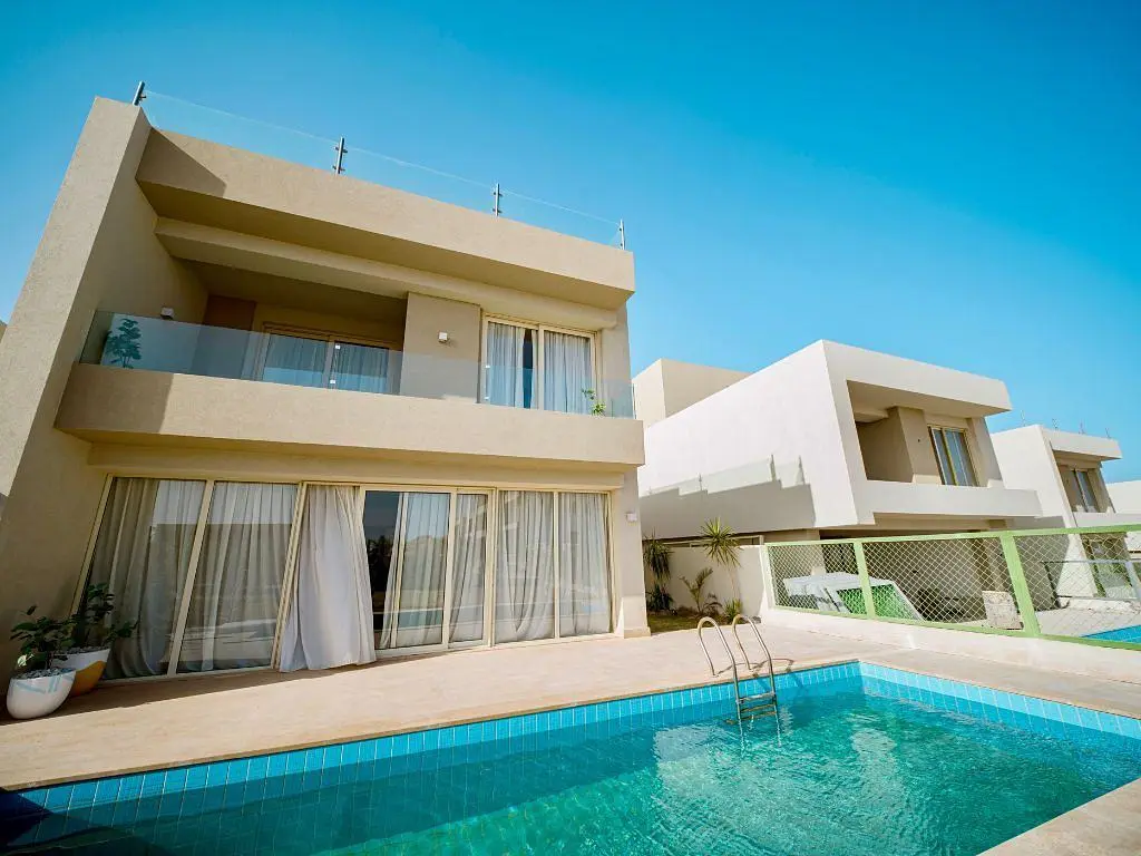 Kitchen; kitchen appliances, wood floor, natural light, modern style