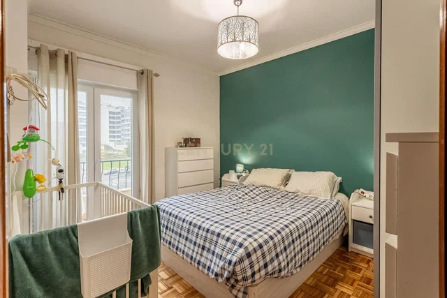 Kitchen; kitchen appliances, wood floor, natural light, modern style