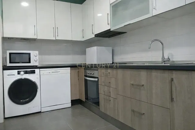 Kitchen; kitchen appliances, wood floor, natural light, modern style