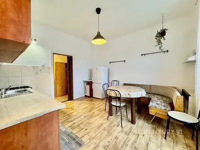 Kitchen; kitchen appliances, wood floor, natural light, modern style