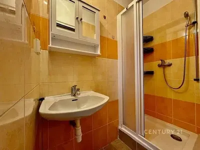 Kitchen; kitchen appliances, wood floor, natural light, modern style