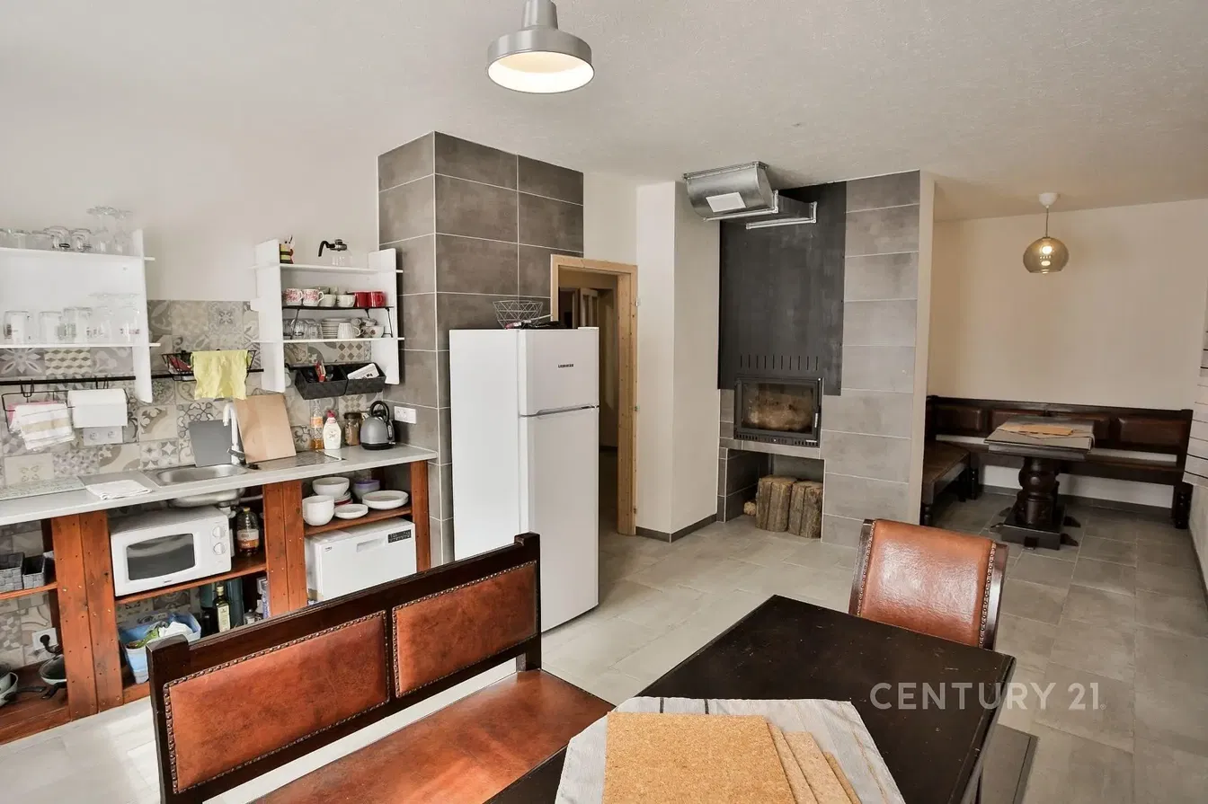 Kitchen; kitchen appliances, wood floor, natural light, modern style