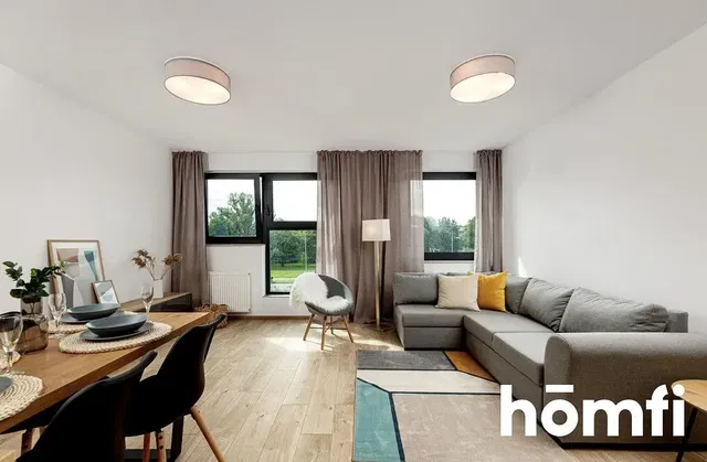 Cucina; elettrodomestici, pavimento in legno, luce naturale, stile moderno