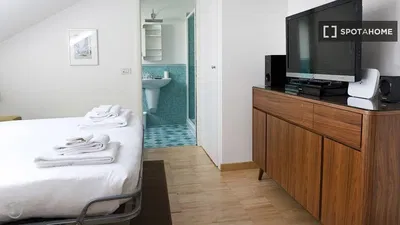 Kitchen; kitchen appliances, wood floor, natural light, modern style