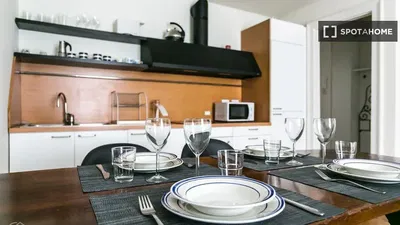 Kitchen; kitchen appliances, wood floor, natural light, modern style