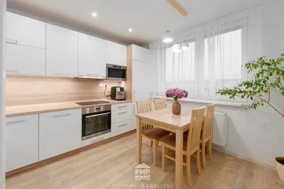 Kitchen; kitchen appliances, wood floor, natural light, modern style