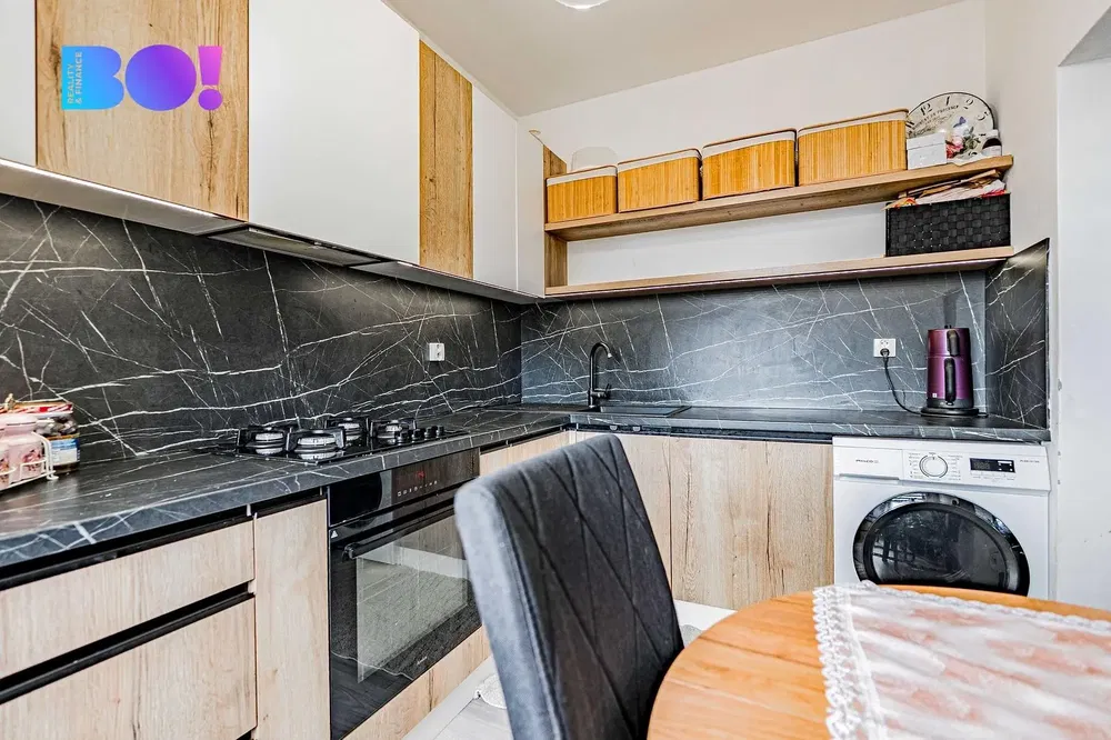 Kitchen; kitchen appliances, wood floor, natural light, modern style