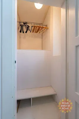 Kitchen; kitchen appliances, wood floor, natural light, modern style