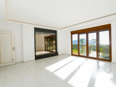 Kitchen; kitchen appliances, wood floor, natural light, modern style