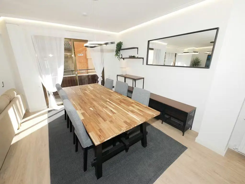 Kitchen; kitchen appliances, wood floor, natural light, modern style