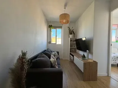 Kitchen; kitchen appliances, wood floor, natural light, modern style