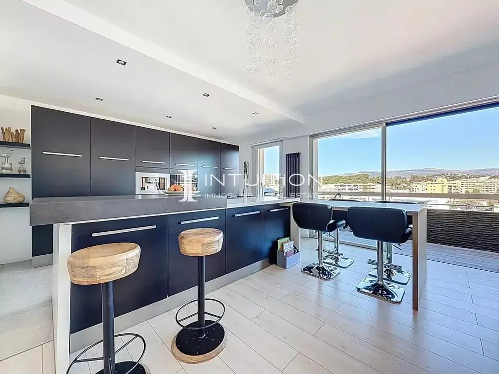 Kitchen; kitchen appliances, wood floor, natural light, modern style