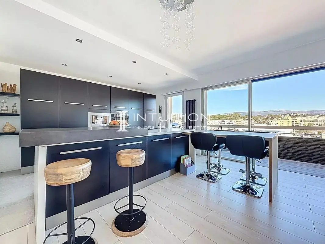 Kitchen; kitchen appliances, wood floor, natural light, modern style