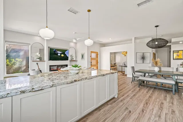 Kitchen; kitchen appliances, wood floor, natural light, modern style