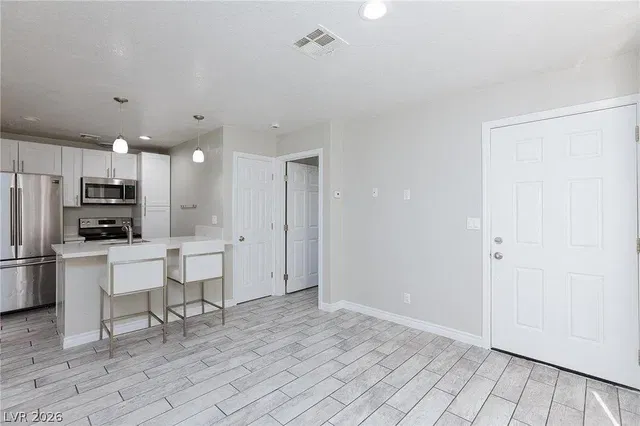 Living room; wood floor, natural light, modern style