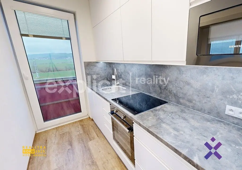 Kitchen; kitchen appliances, wood floor, natural light, modern style