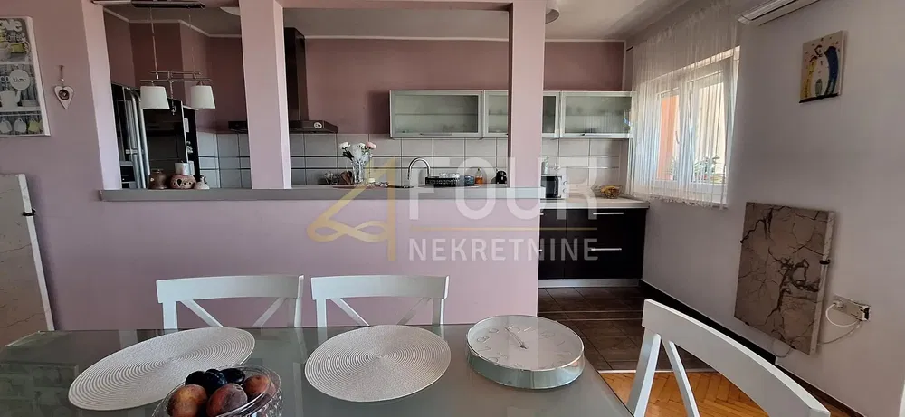 Kitchen; kitchen appliances, wood floor, natural light, modern style