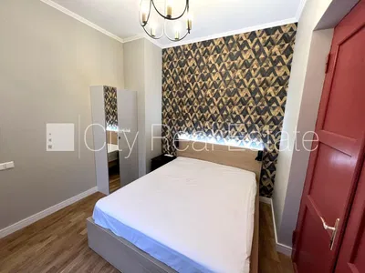 Kitchen; kitchen appliances, wood floor, natural light, modern style