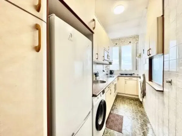 Kitchen; kitchen appliances, wood floor, natural light, modern style