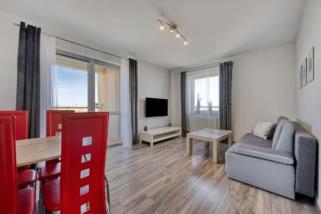 Kitchen; kitchen appliances, wood floor, natural light, modern style