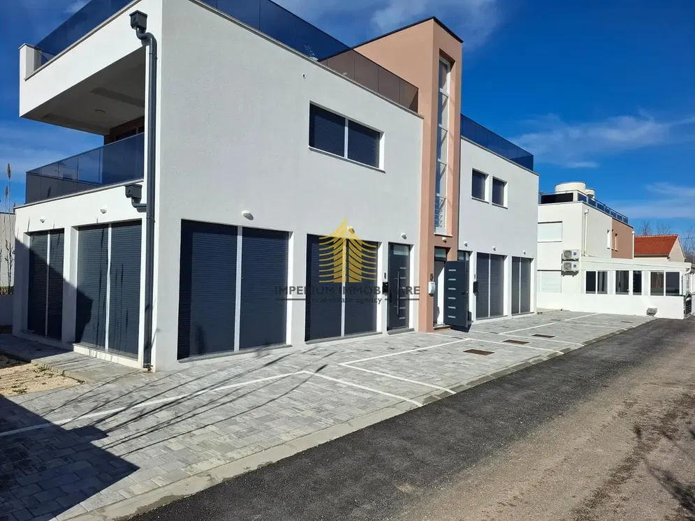 Kitchen; kitchen appliances, wood floor, natural light, modern style