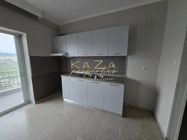 Kitchen; kitchen appliances, wood floor, natural light, modern style
