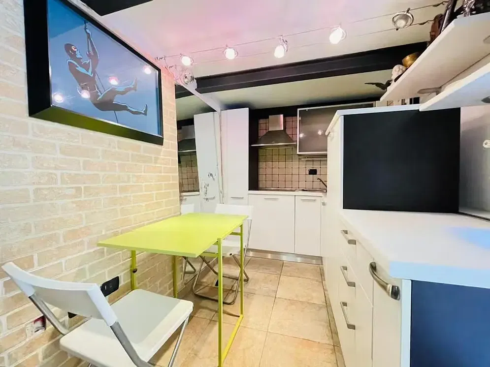 Kitchen; kitchen appliances, wood floor, natural light, modern style